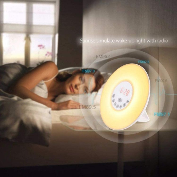 Bedside lamp with sunrise simulation and gentle wake-up alarm