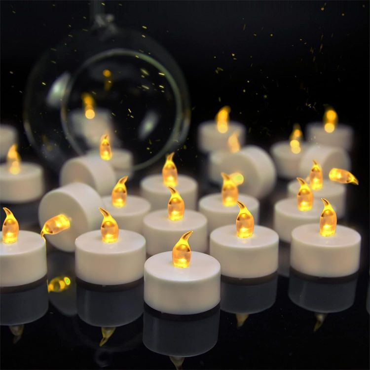 Picture of 24pcs Tea Lights Candles:Realistic LED Flameless Flickering Operated Tea Lights Steady Battery Tealights Electric Fake Candles Decoration for Party and Gifts Ideas(Warm Yellow Light)