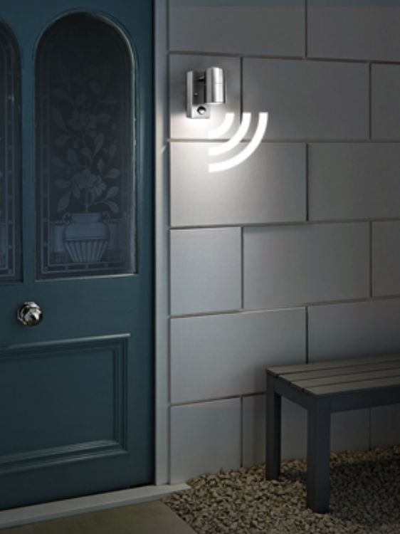 Stylish outdoor wall light for pathway and entrance illumination