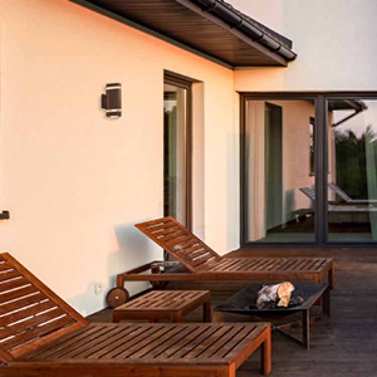 Waterproof aluminum wall sconce for gardens and patios.