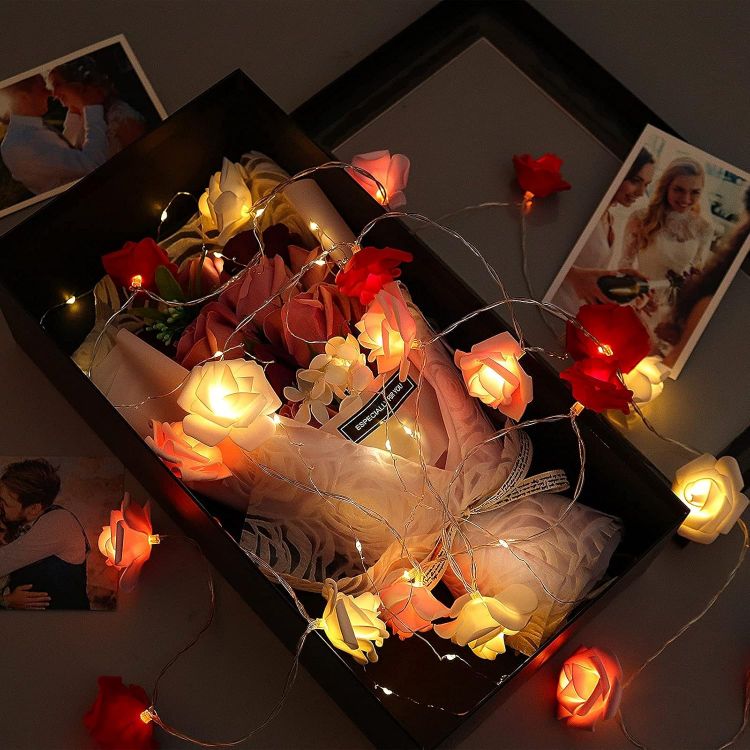 Rose fairy lights creating cozy bedroom ambiance