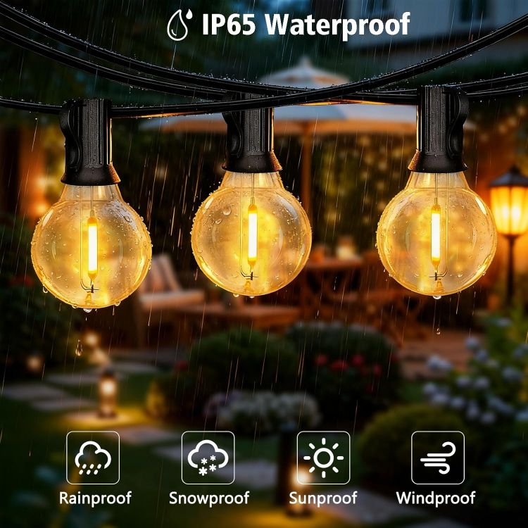 Decorative festoon lights hanging on pergola structure