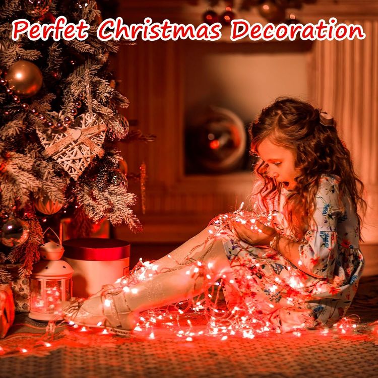 Spooky Halloween party decorated with red fairy lights creating atmospheric lighting