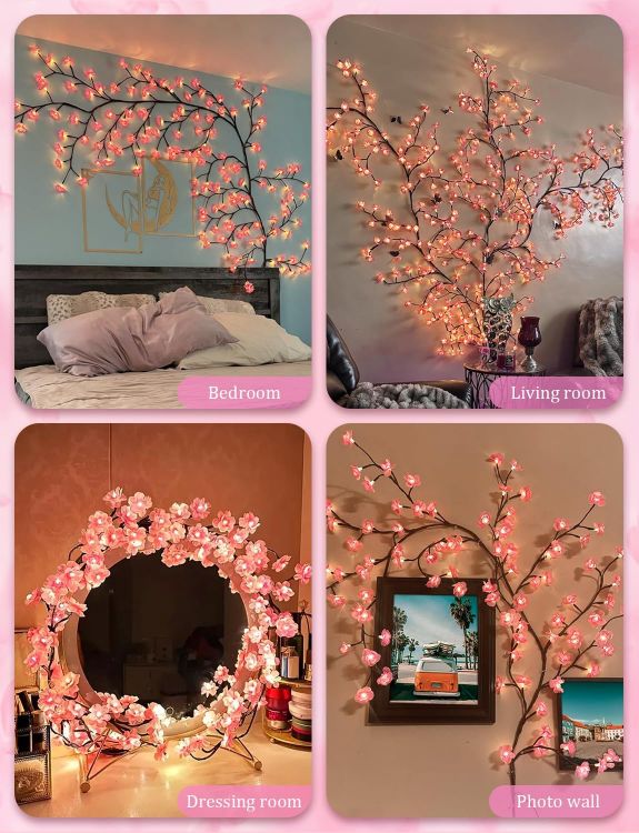 Vanity mirror frame adorned with LED cherry blossom branch lights creating elegant reflection