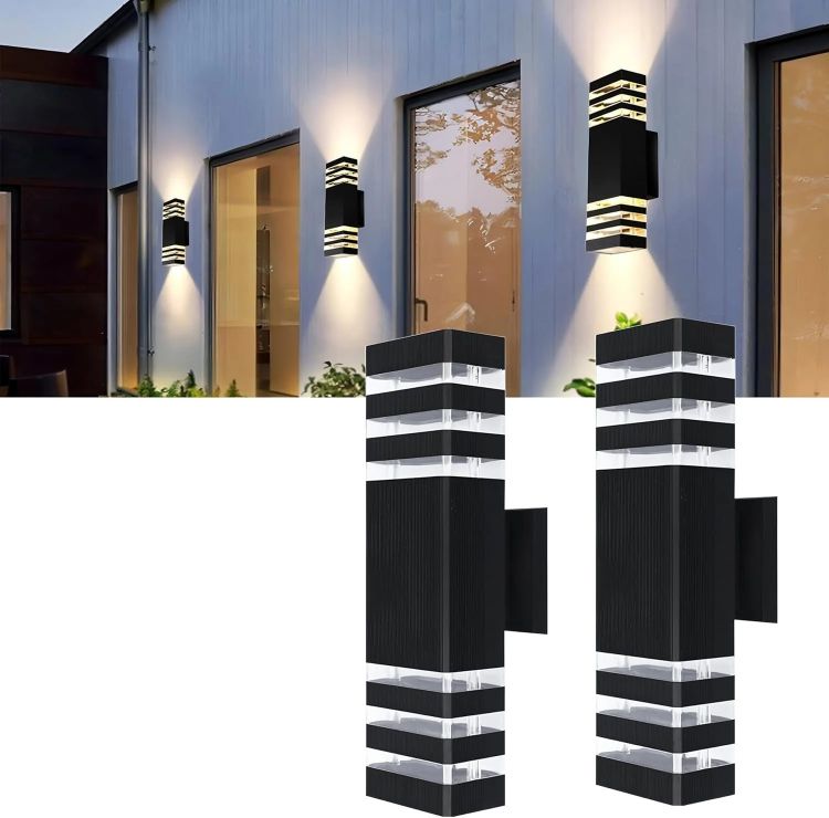 Two modern outdoor up and down wall lights mounted on exterior wall