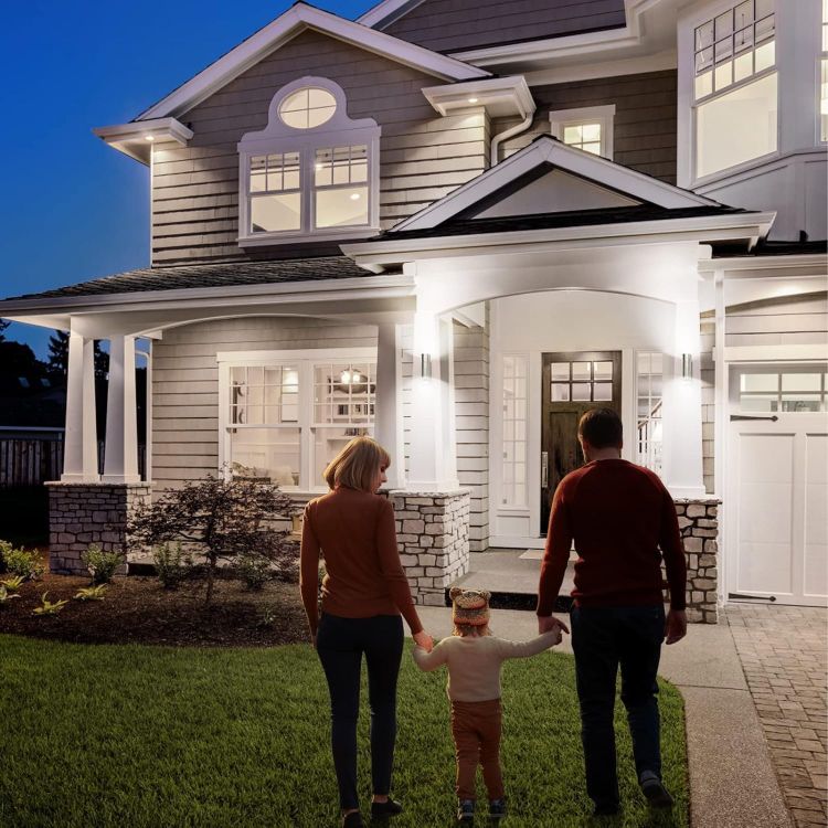 Four motion-activated exterior wall lamps installed outdoors