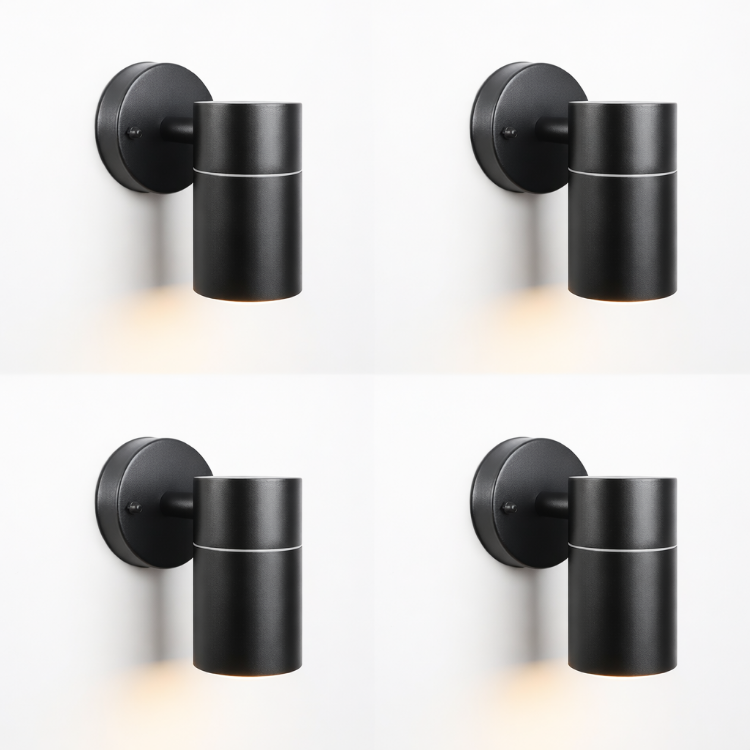 Black down-only wall light installed on patio wall