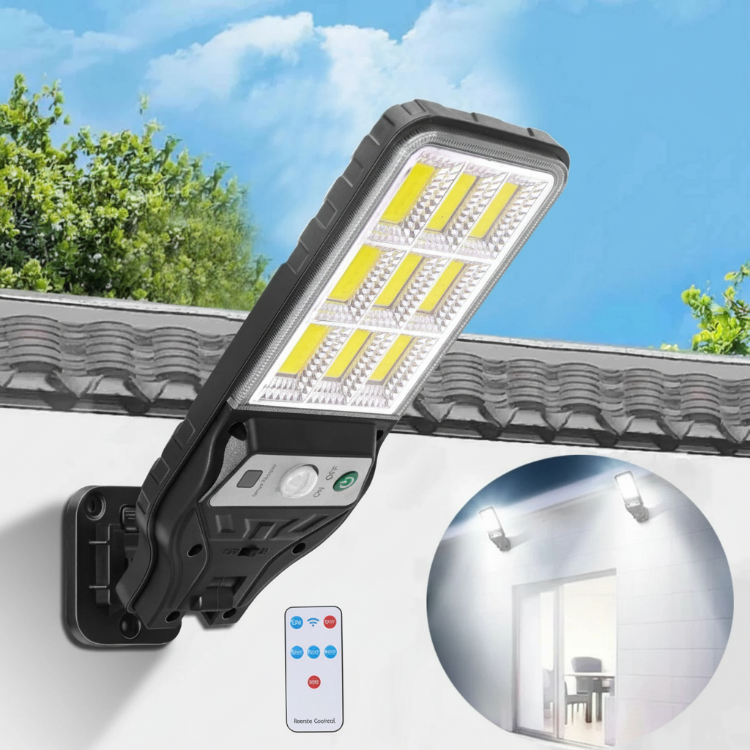 Solar LED wall flood light with PIR motion sensor mounted on a garden wall