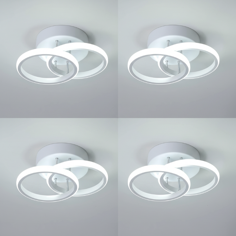 Four white modern creative ceiling lights installed indoors