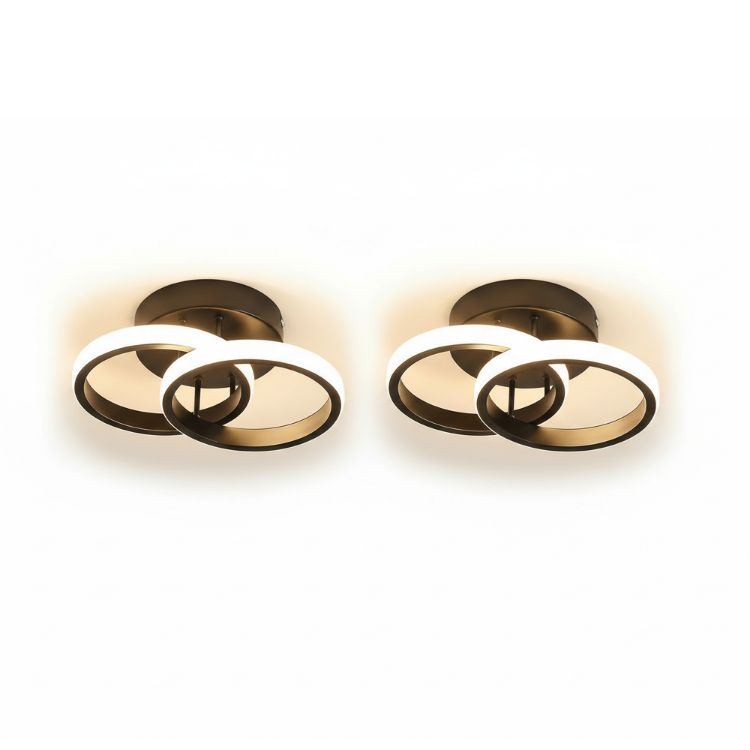Two modern interlocking ring LED ceiling lights installed indoors