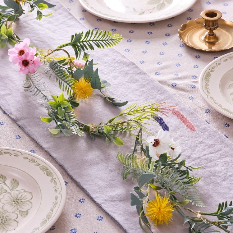 artificial floral garland with warm white glow