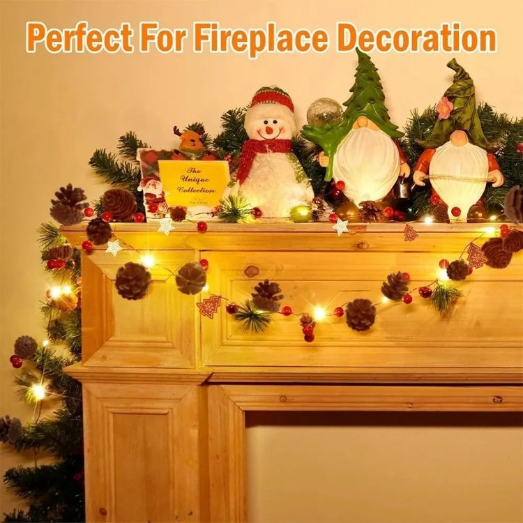 Picture of Christmas Garland 6.6FT Pinecones Christmas String Lights with Red Berries, Bells & Needles, 20 LED Battery Operated Prelit Garland for Christmas Decorations Indoor/Outdoor