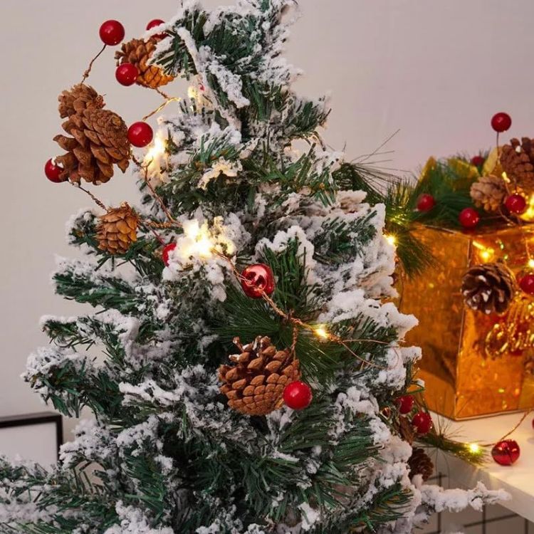 Picture of Christmas Garland 6.6FT Pinecones Christmas String Lights with Red Berries, Bells & Needles, 20 LED Battery Operated Prelit Garland for Christmas Decorations Indoor/Outdoor