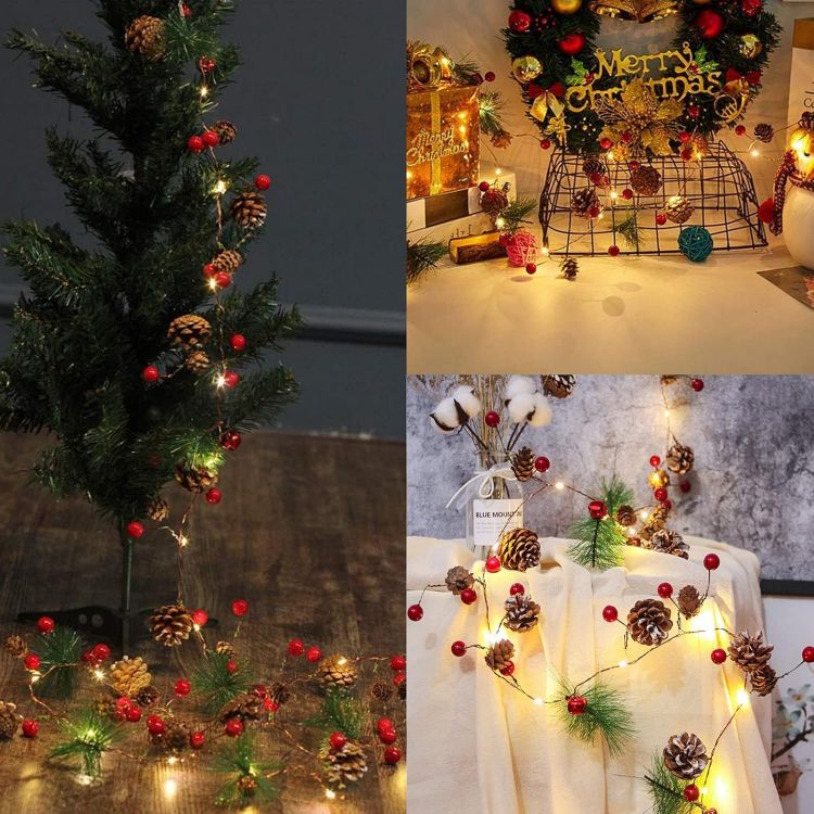 Picture of Christmas Garland 6.6FT Pinecones Christmas String Lights with Red Berries, Bells & Needles, 20 LED Battery Operated Prelit Garland for Christmas Decorations Indoor/Outdoor