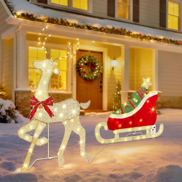 Picture of Outdoor Christmas Decorations, Light up Reindeer Outdoors with Warm White Lights, Motion Sensor Music Xmas Decor, Christmas Sleigh for Lawn Porch Garden