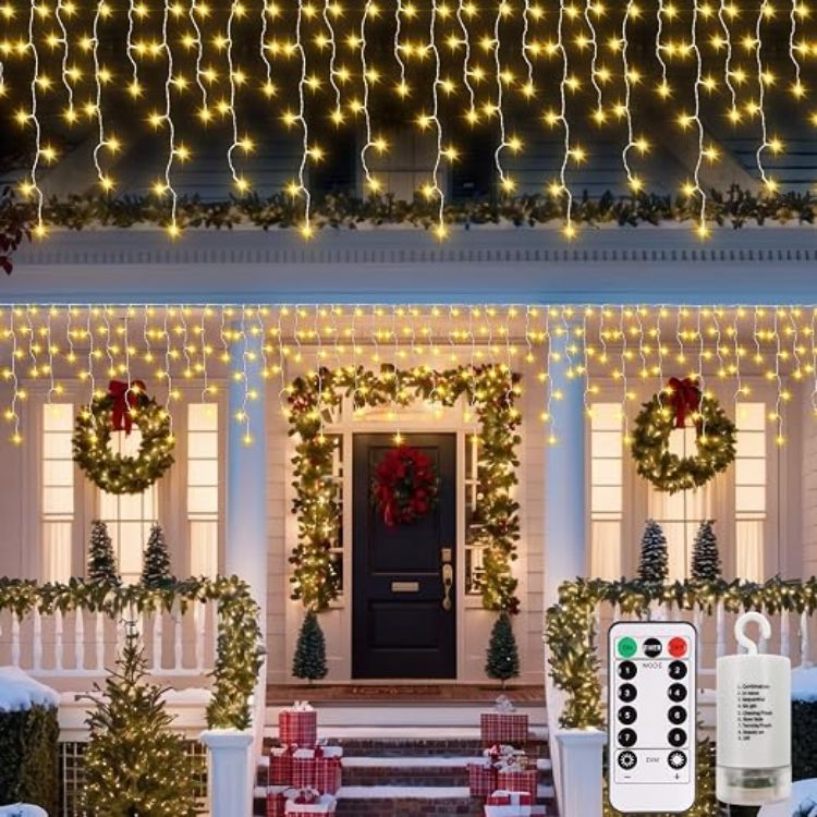 Picture of Outdoor Christmas Lights 6M 300 LED with Remote Timer  8 Modes Icicle Fairy Lights Battery Operated Curtain String Lights for Window Gazebo Balcony Eaves Decor (Cool White)